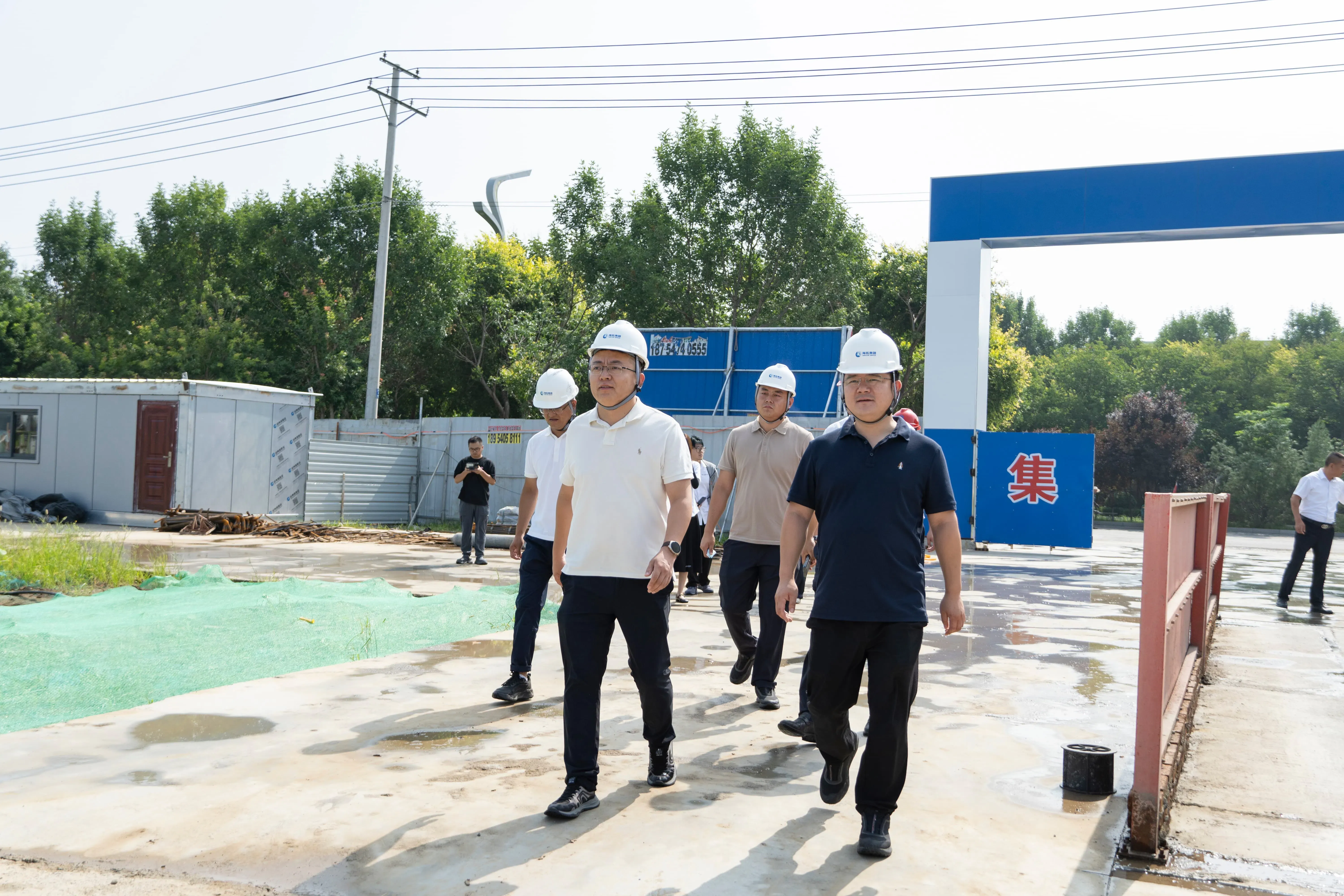 Hightop Group management team attending new factory construction ceremony